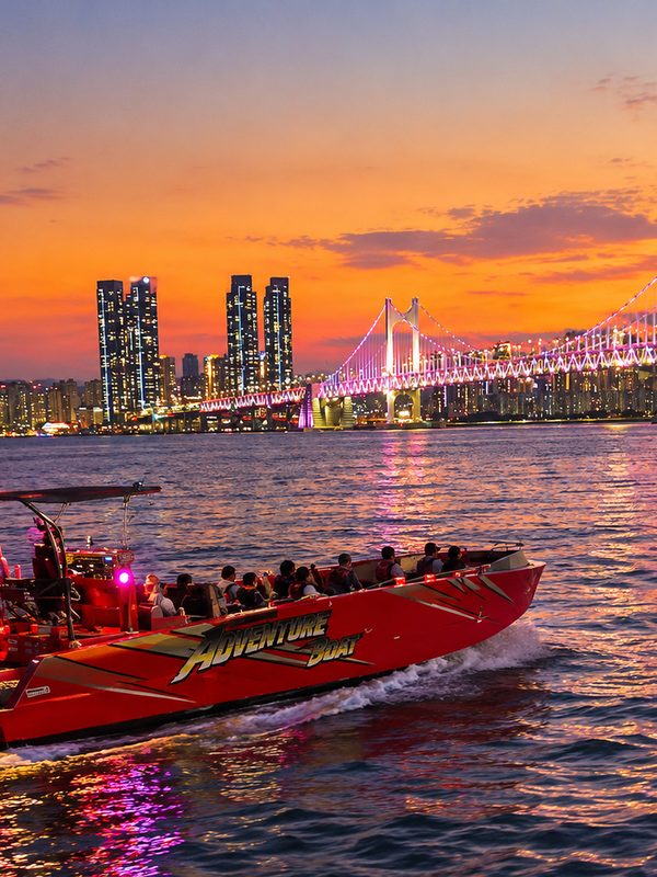 Adventure boat on the sea at sunset