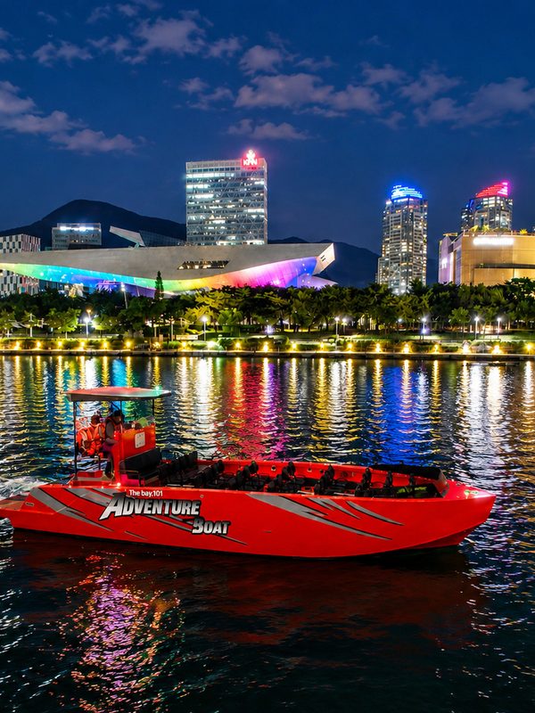 Boat running past the Marine City night view