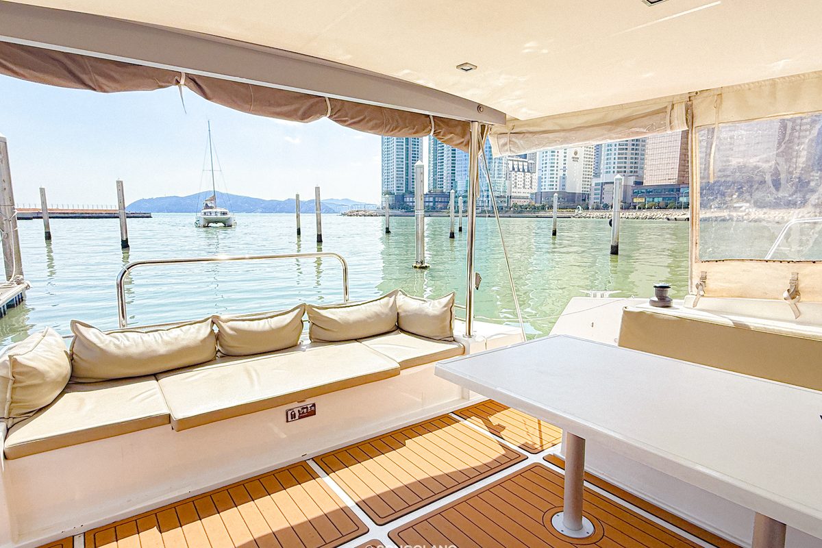 Deck of the BALI yacht with sofas