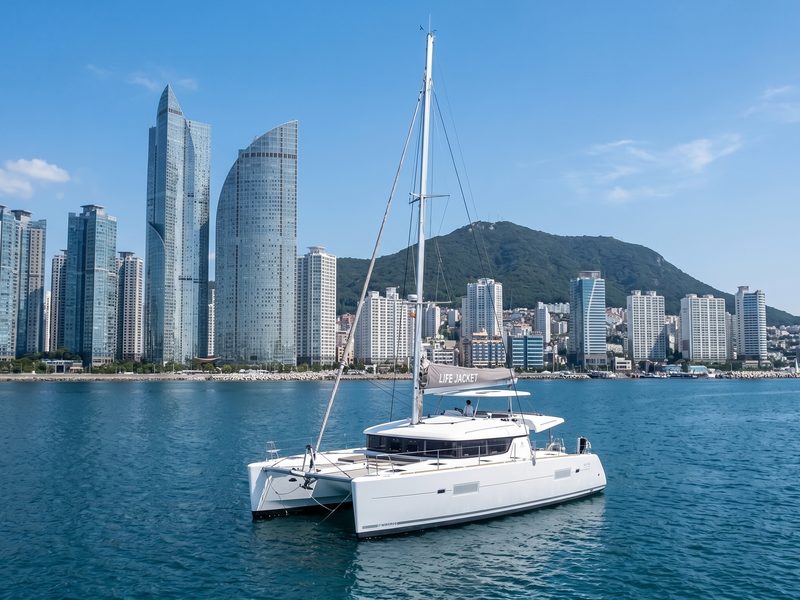 Catamaran yacht passing Marine City in Haeundae